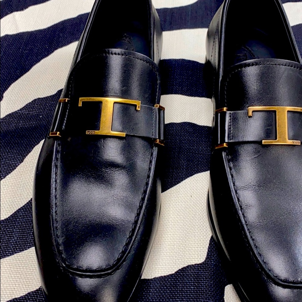 Todd’s black shoes never worn